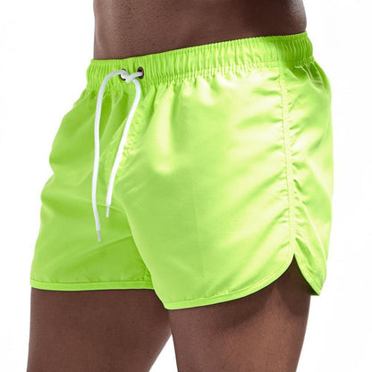 Men's plain swim shorts with elasticated waistband and drawstring