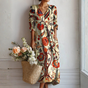 Multicoloured floral wrap maxi dress with V-neckline and three-quarter sleeves
