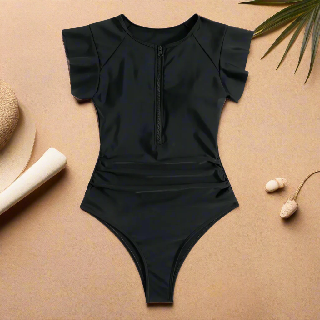 Women's short-sleeve one-piece swimsuit with front zip and leafy print