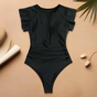 Women's short-sleeve one-piece swimsuit with front zip and leafy print