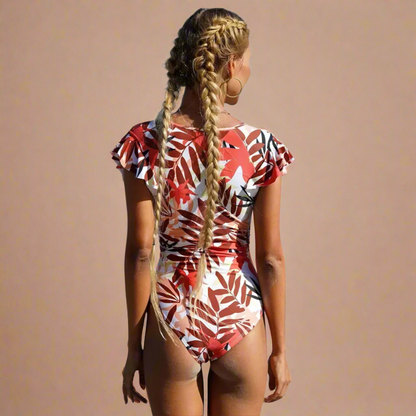 Women's short-sleeve one-piece swimsuit with front zip and leafy print