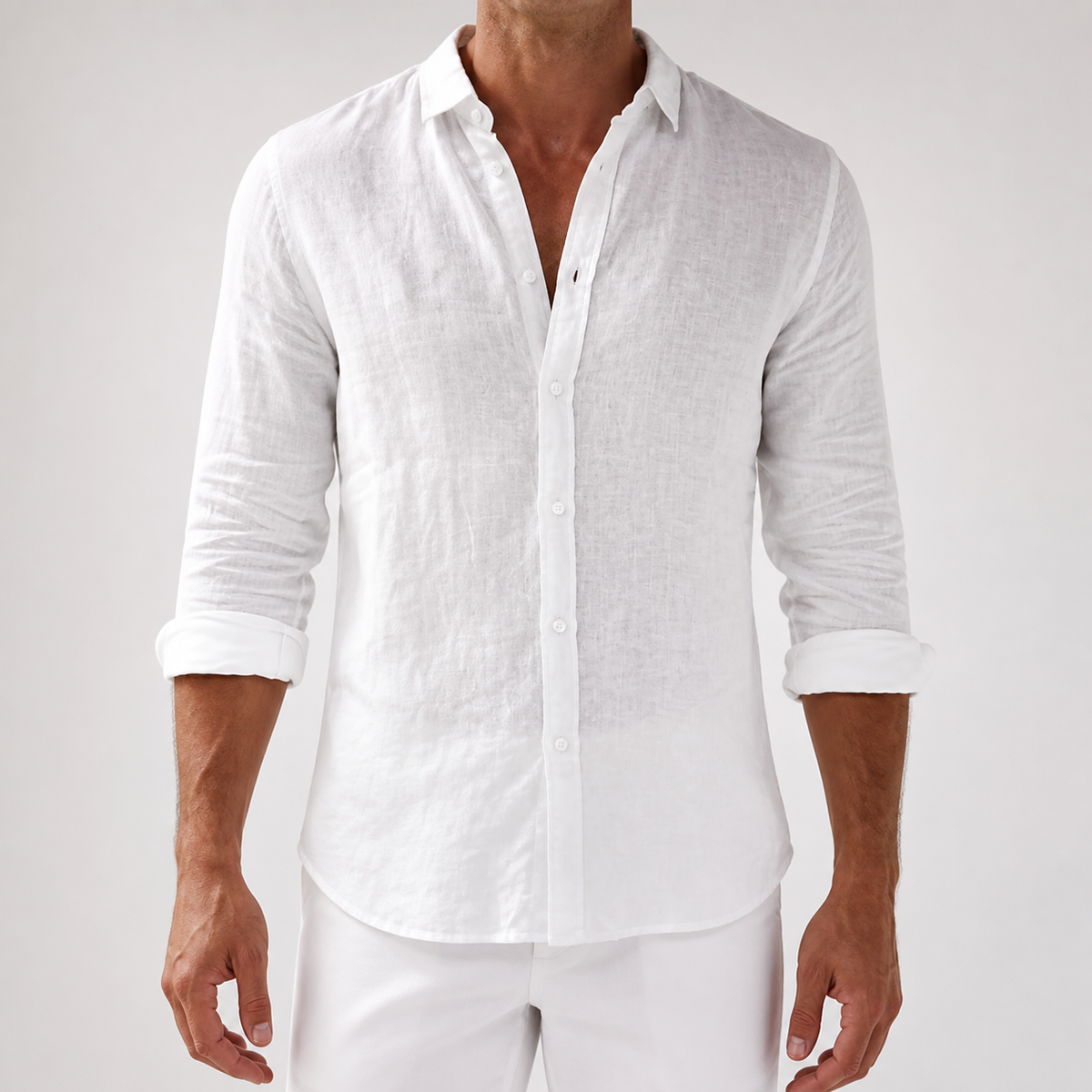 Men's long-sleeve button-front shirt with classic collar and curved hem