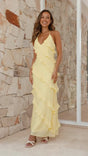 Women's yellow halter maxi dress with layered ruffles and open back