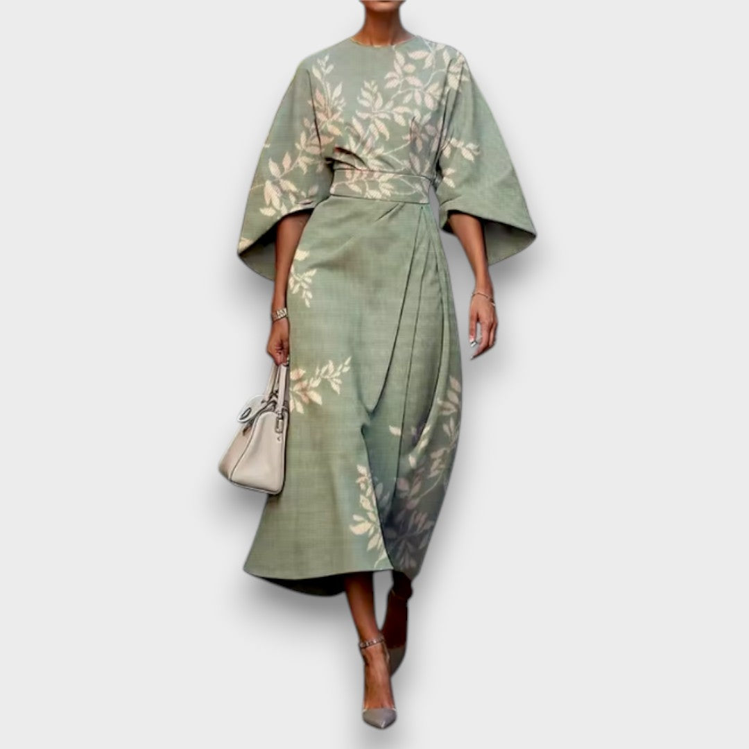 Women's floral midi dress with round neckline and flowing cape sleeves