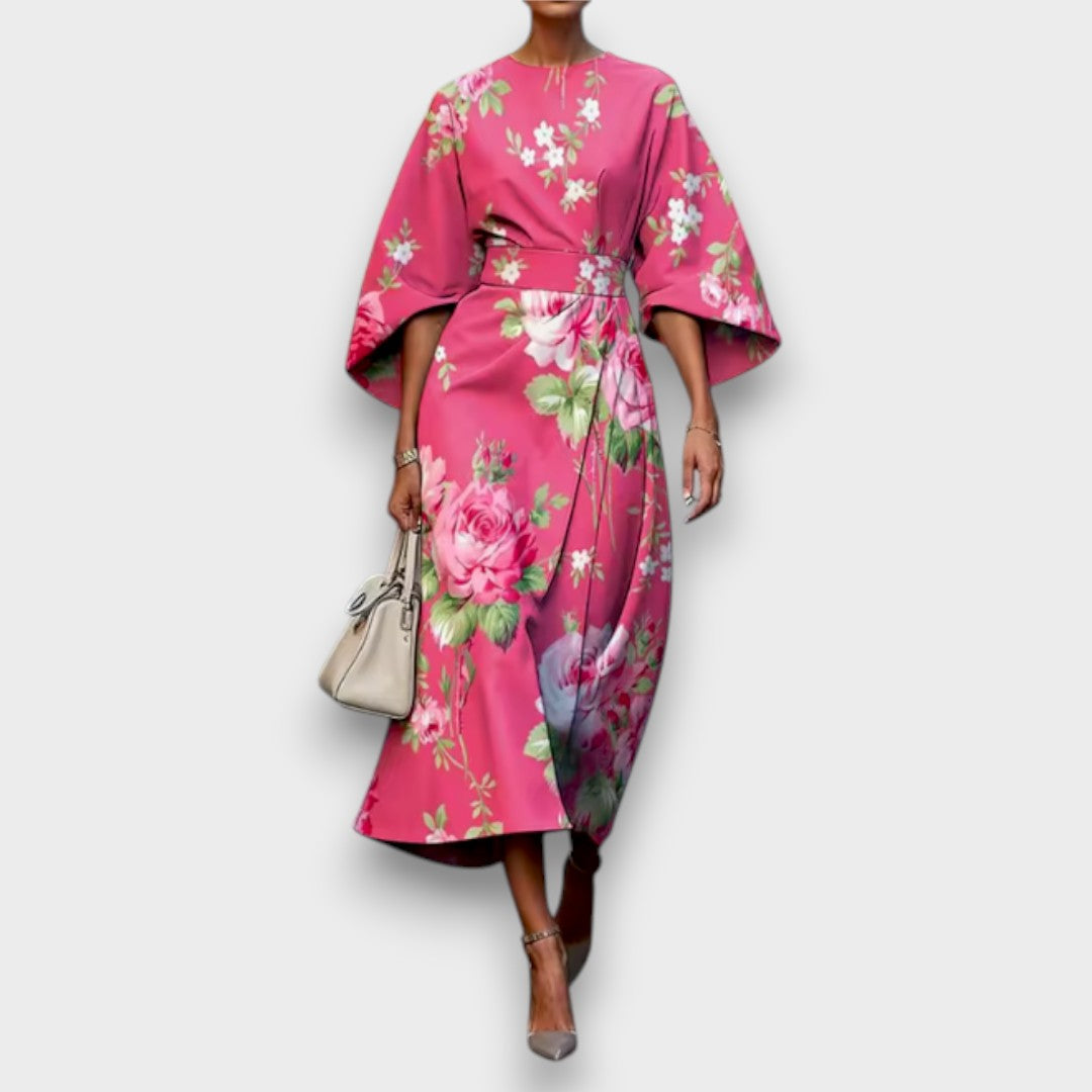 Women's floral midi dress with round neckline and flowing cape sleeves