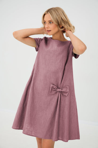 Women's A-line short dress with round neckline, short sleeves, bow detail and front pockets