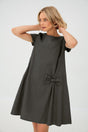 Women's A-line short dress with round neckline, short sleeves, bow detail and front pockets