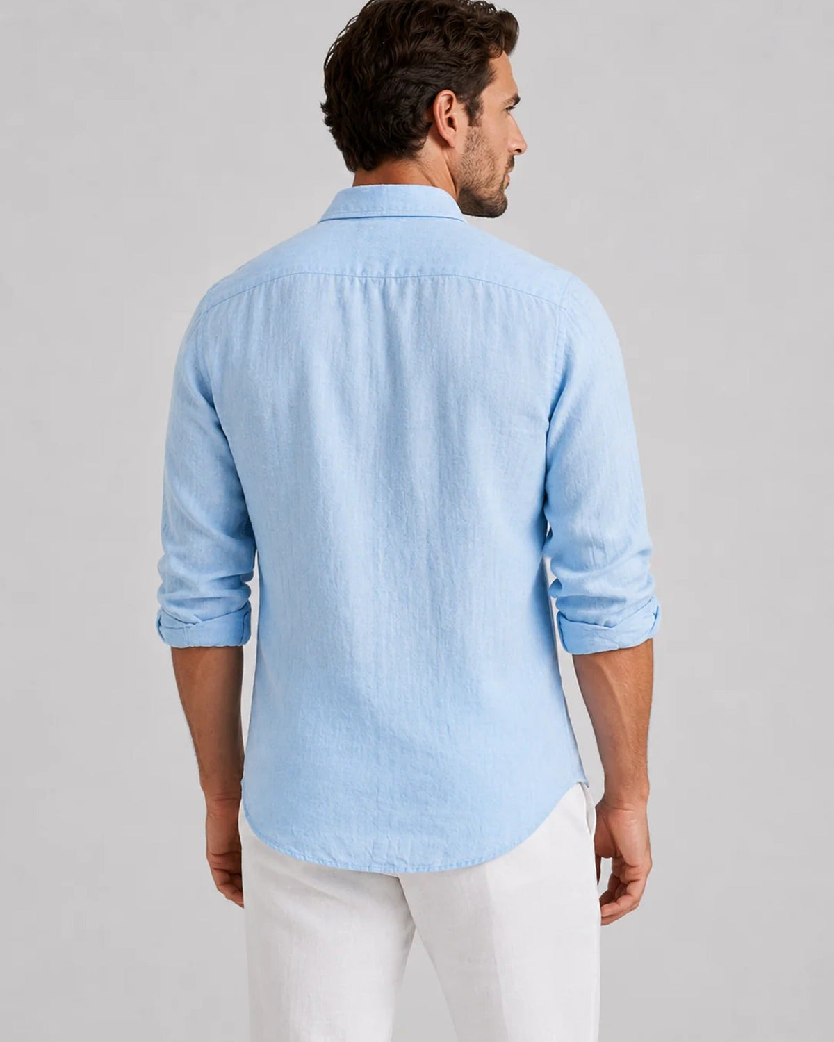 Men's long-sleeve collared shirt with button front and curved hem