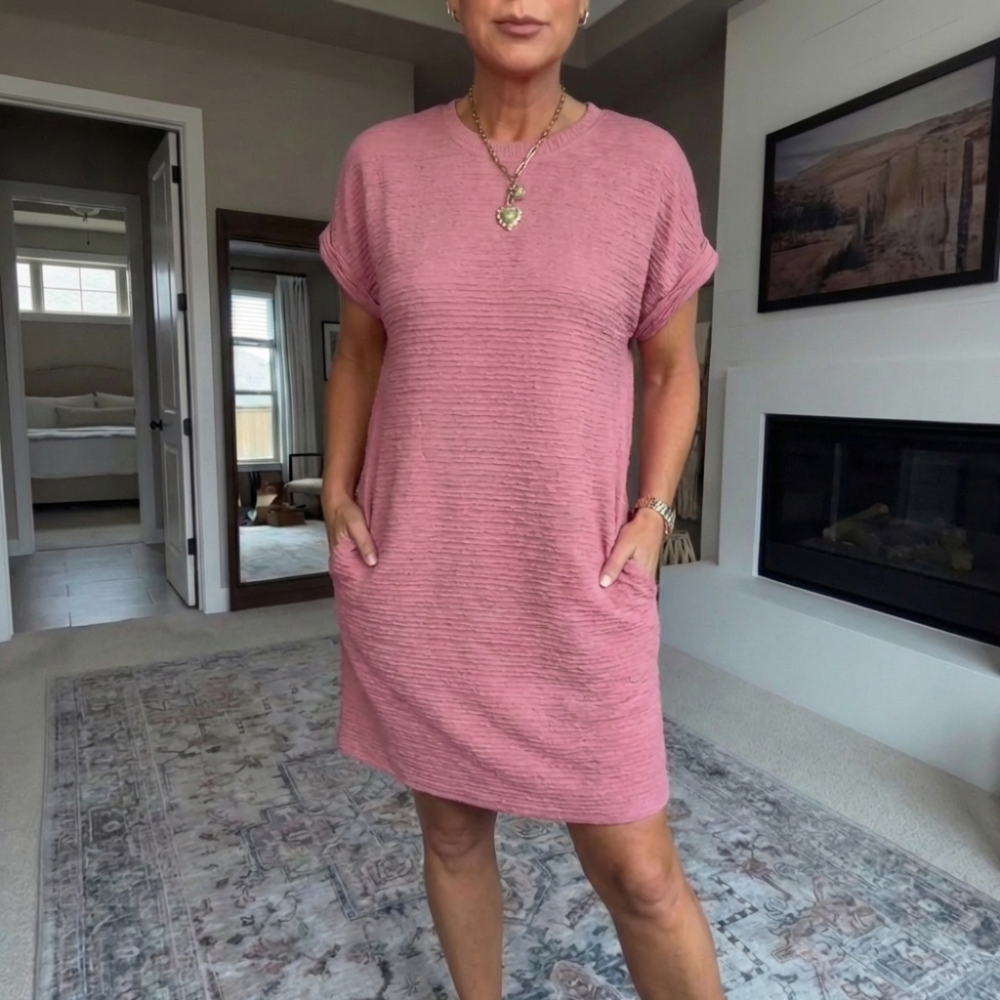 Women's textured short dress with crew neckline, short sleeves and side pockets