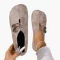Women's slip-on flat shoes with round toes and button-style elastic detail