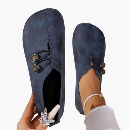 Women's slip-on flat shoes with round toes and button-style elastic detail