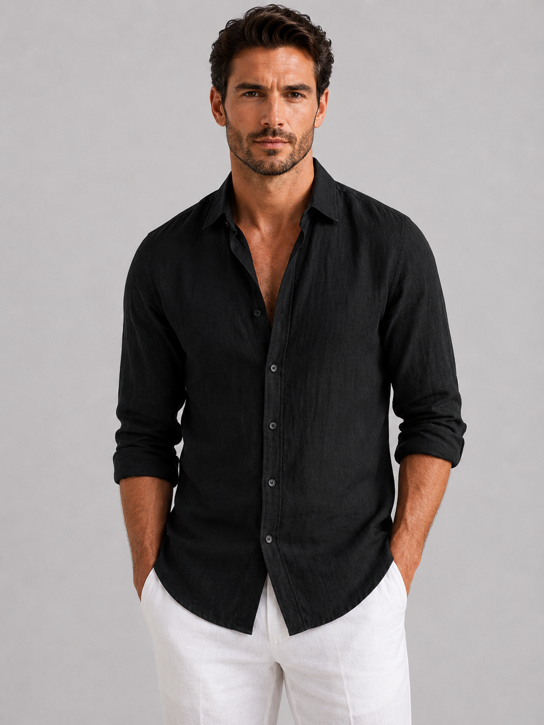 Men's long-sleeve textured button-up shirt with pointed collar and curved hem