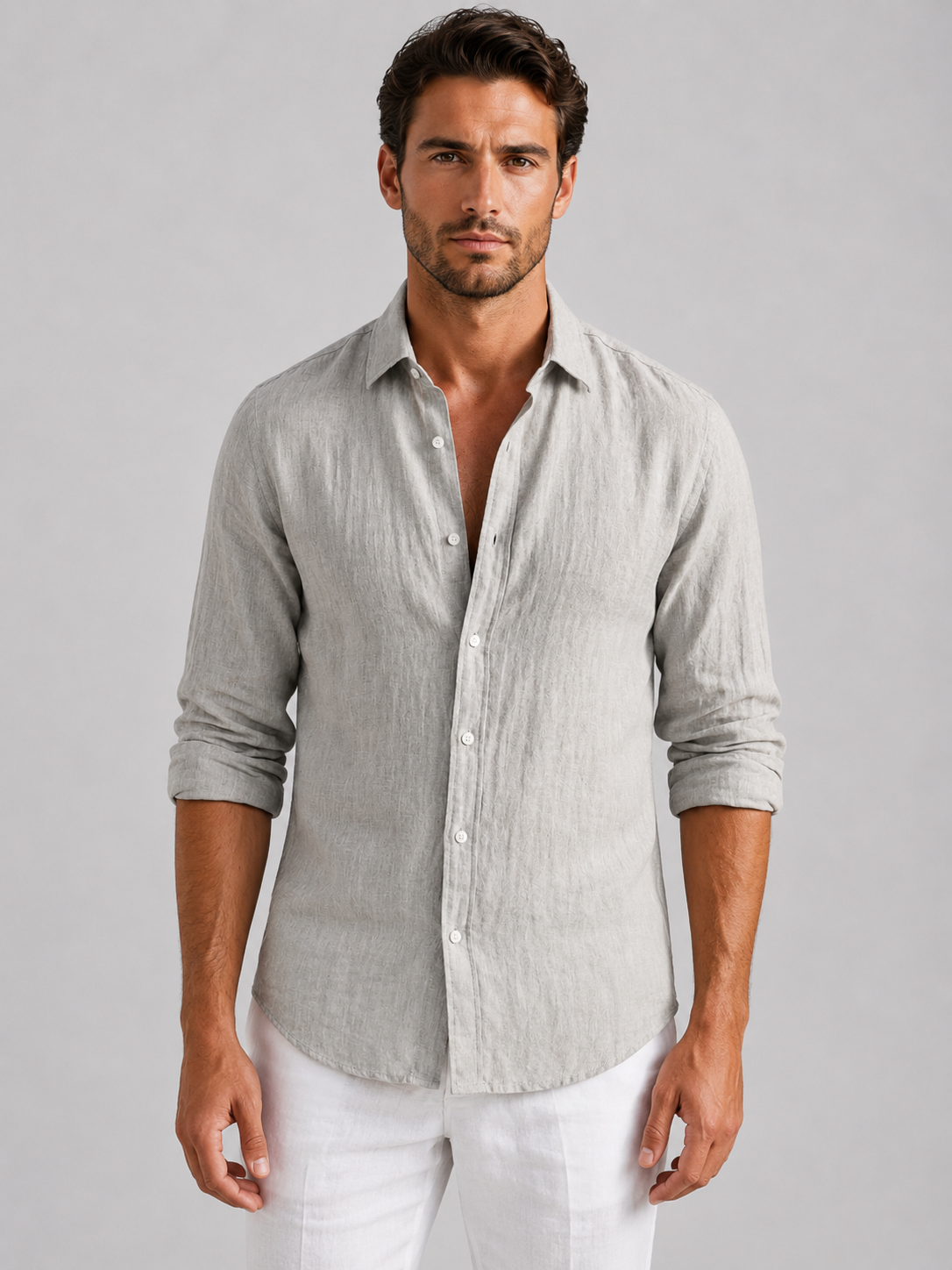 Men's long-sleeve textured button-up shirt with pointed collar and curved hem