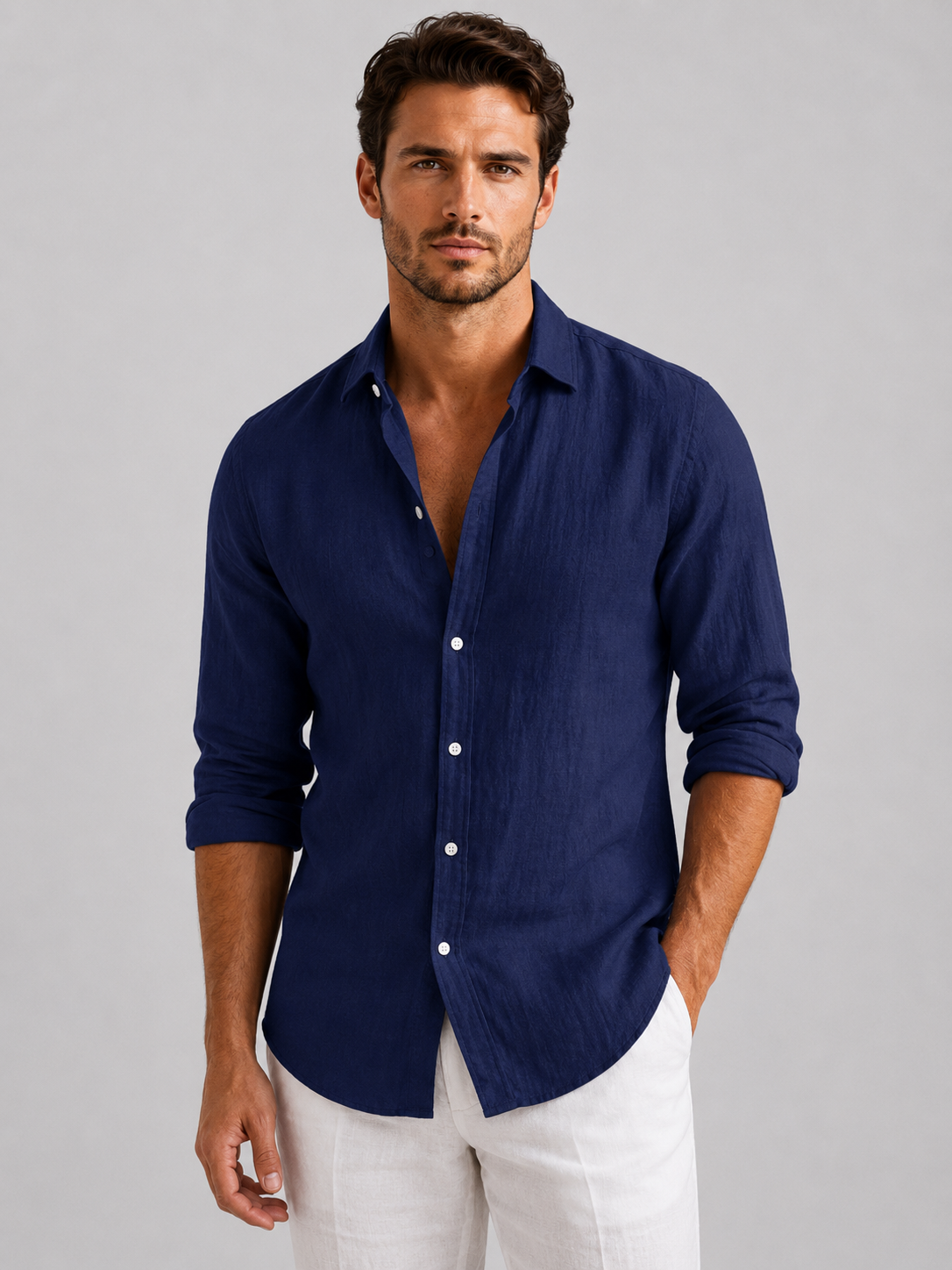 Men's long-sleeve textured button-up shirt with pointed collar and curved hem