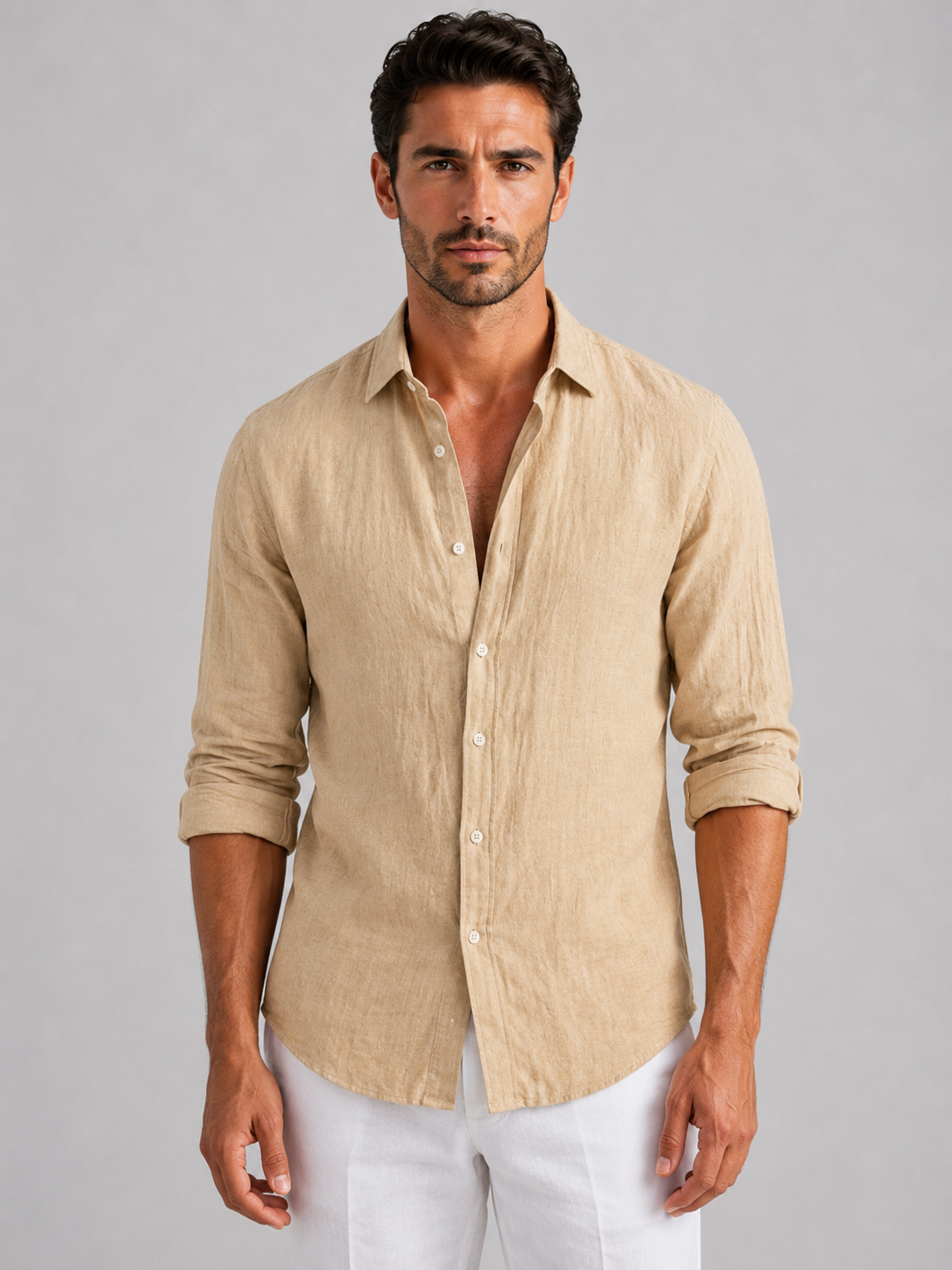 Men's long-sleeve textured button-up shirt with pointed collar and curved hem