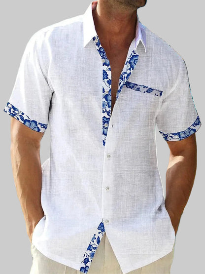 Men's short sleeve shirt with contrasting floral trim on the placket, cuffs and chest pocket