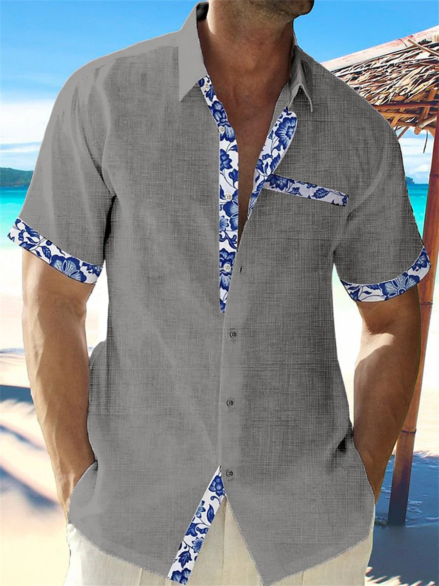 Men's short sleeve shirt with contrasting floral trim on the placket, cuffs and chest pocket