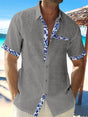 Men's short sleeve shirt with contrasting floral trim on the placket, cuffs and chest pocket