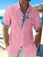 Men's short sleeve shirt with contrasting floral trim on the placket, cuffs and chest pocket