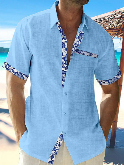 Men's short sleeve shirt with contrasting floral trim on the placket, cuffs and chest pocket