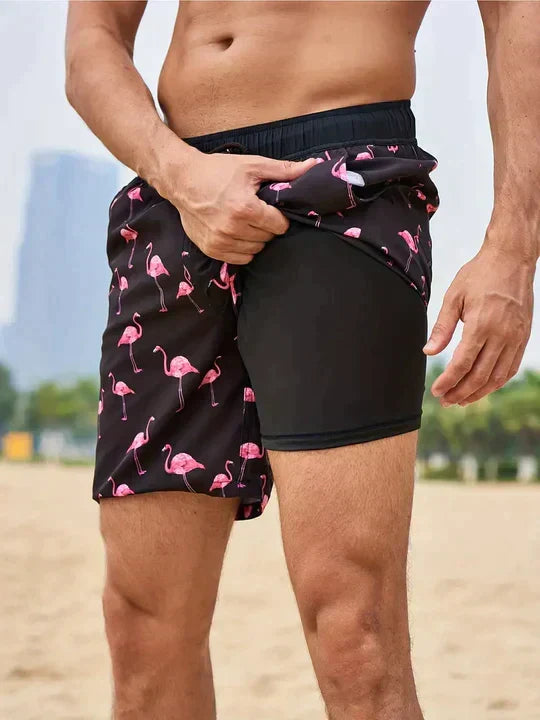Men's printed swim shorts with drawstring waist and integrated compression liner