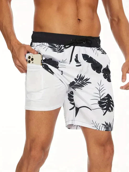 Men's printed swim shorts with drawstring waist and integrated compression liner