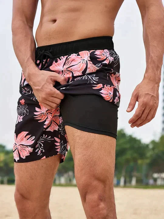 Men's printed swim shorts with drawstring waist and integrated compression liner