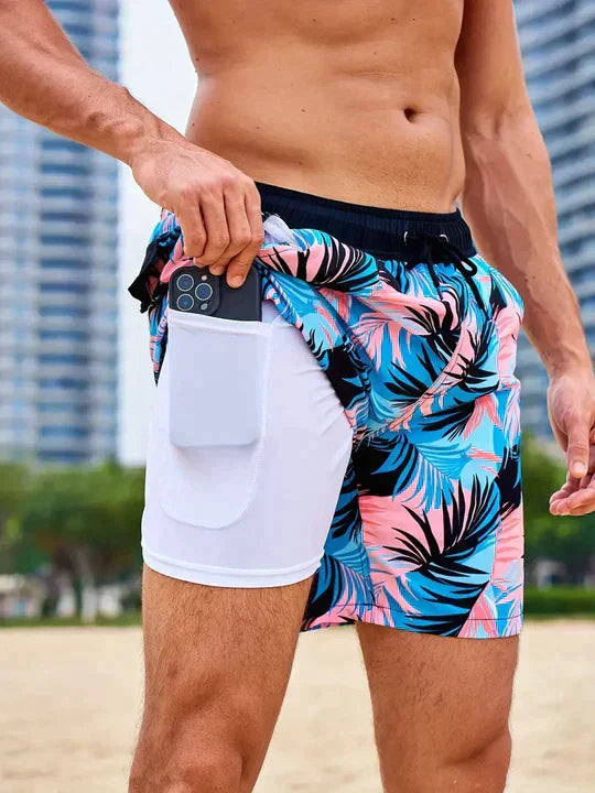 Men's printed swim shorts with drawstring waist and integrated compression liner
