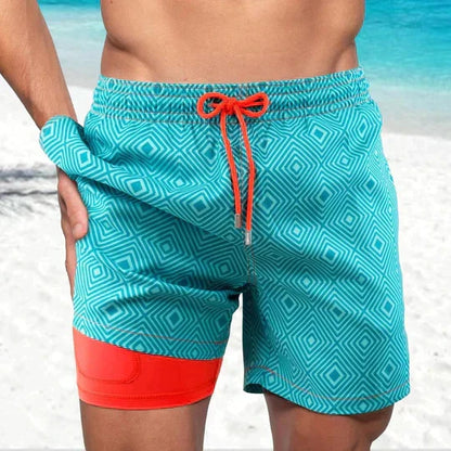 Men's printed swim shorts with drawstring waist and integrated compression liner
