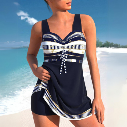 Women's sleeveless patterned swim dress with tie front and integrated shorts