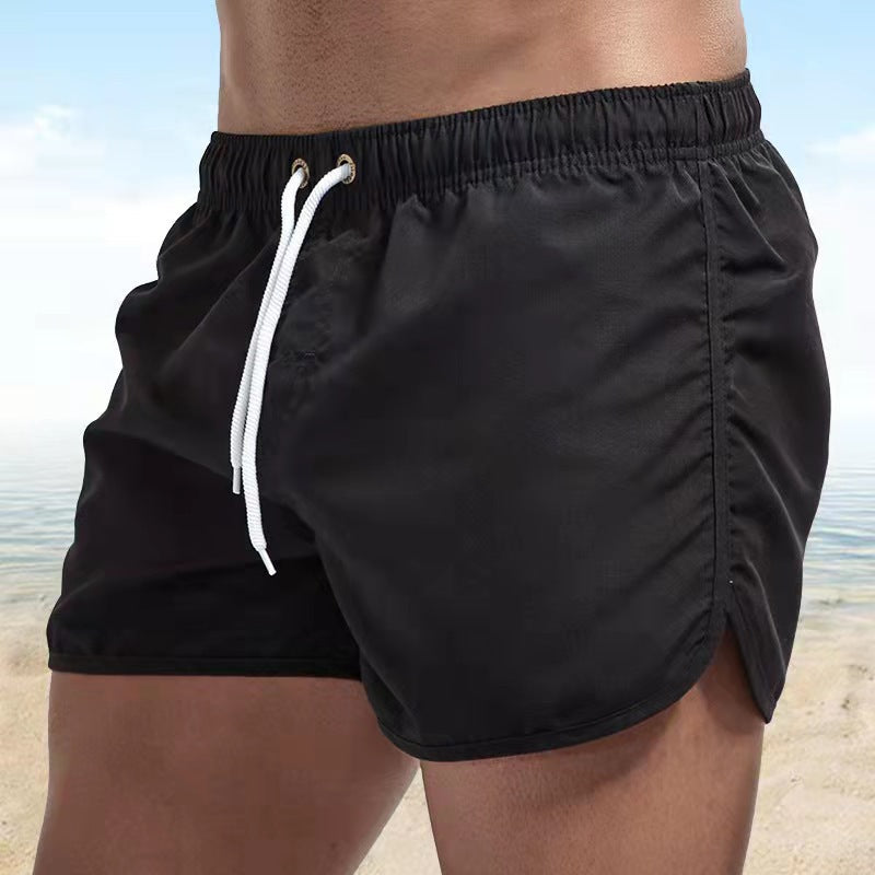 Men's solid swim shorts with elasticated drawstring waist and side pockets
