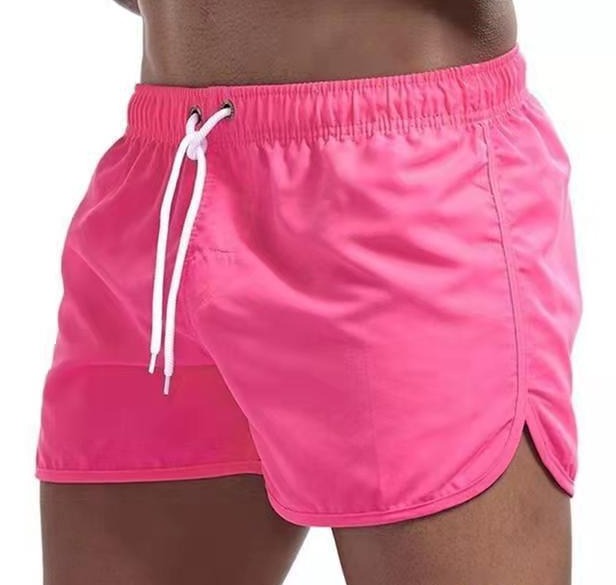 Men's solid swim shorts with elasticated drawstring waist and side pockets