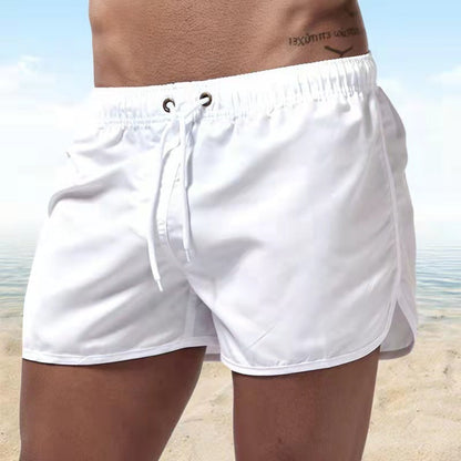 Men's solid swim shorts with elasticated drawstring waist and side pockets