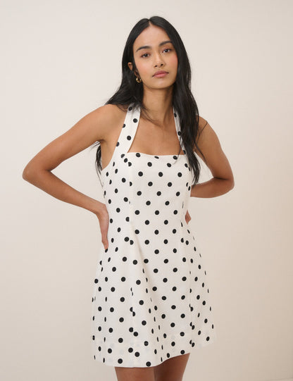 Women's white polka dot halterneck mini dress with square neckline
