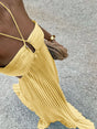 Pleated halter maxi dress with high waist and side cut-outs