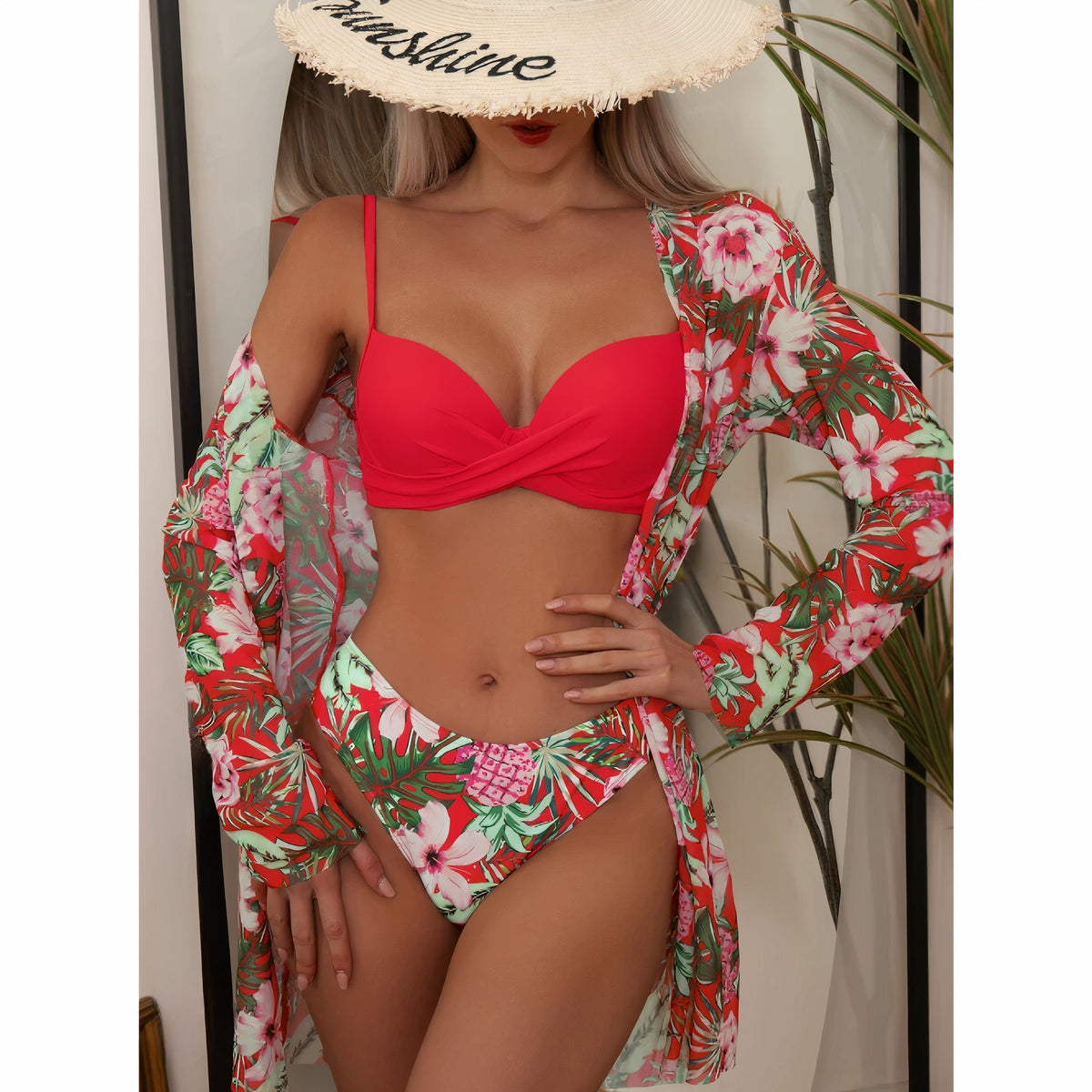 Women's floral three-piece bikini set with twist-front top and long-sleeve cover-up