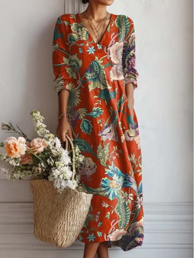 Women's floral midi dress with V-neckline and three-quarter sleeves
