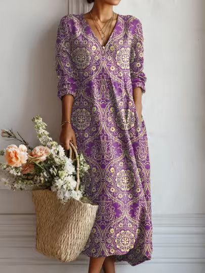 Women's floral midi dress with V-neckline and three-quarter sleeves