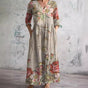 Women's floral V-neck maxi dress with three-quarter sleeves, gathered waist and side pockets