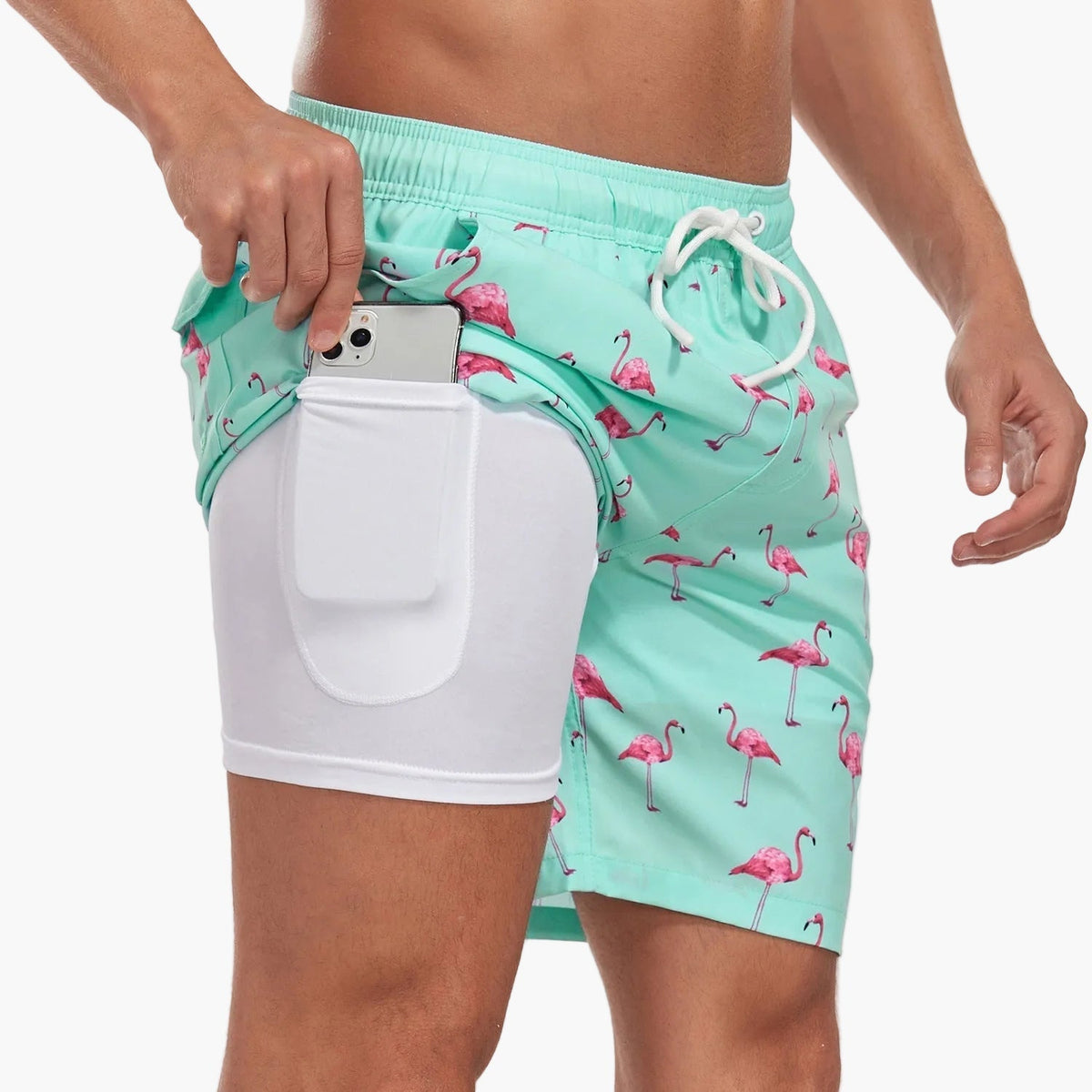 Men's tropical print swim shorts with drawstring waist and inner compression shorts