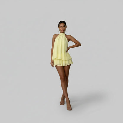 Sleeveless halter mini dress with a tiered layered skirt