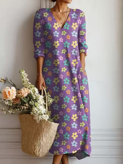 Women's floral midi dress with V-neckline and three-quarter sleeves