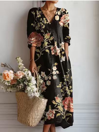 Women's floral midi dress with V-neckline and three-quarter sleeves