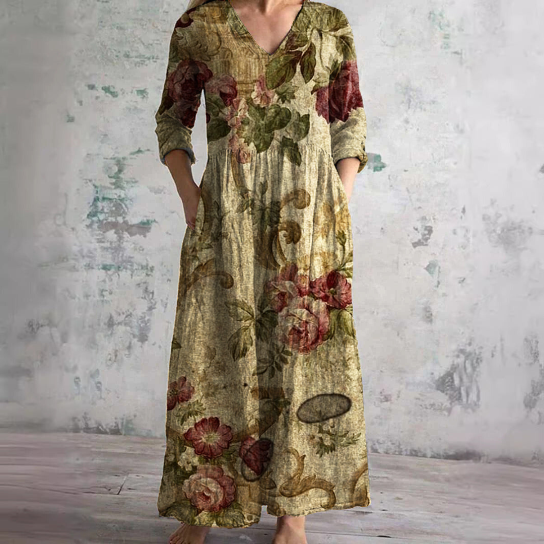 Women's floral V-neck maxi dress with three-quarter sleeves, gathered waist and side pockets