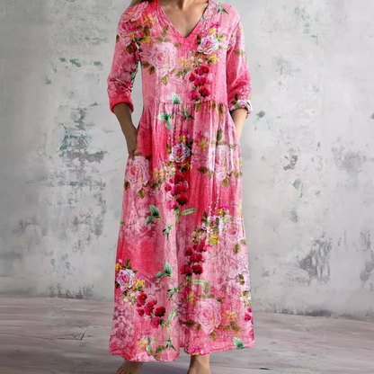 Women's floral V-neck maxi dress with three-quarter sleeves, gathered waist and side pockets