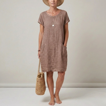 Women's short-sleeve textured mini dress with front patch pockets