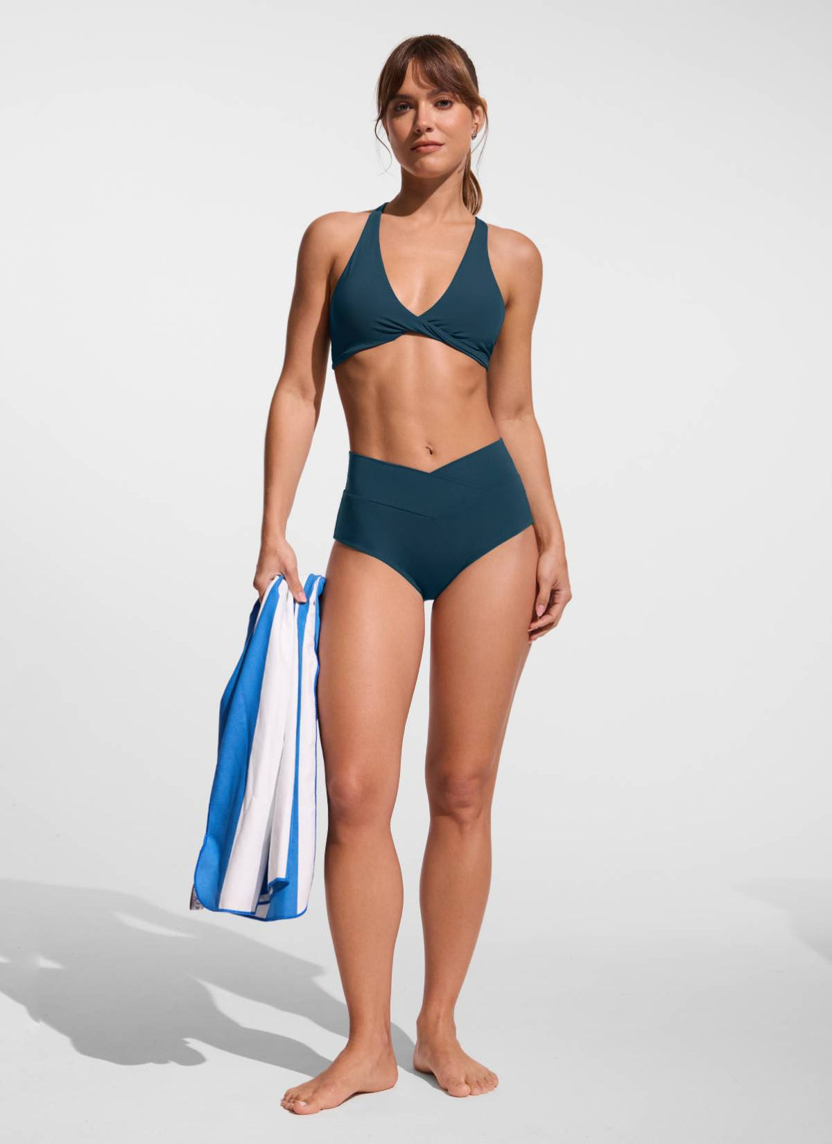 Women's high-waisted bikini bottoms with V cross waist detail