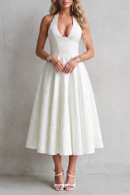 Women's floral halter midi dress with plunging neckline and flared skirt