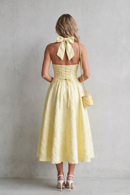 Women's floral halter midi dress with plunging neckline and flared skirt