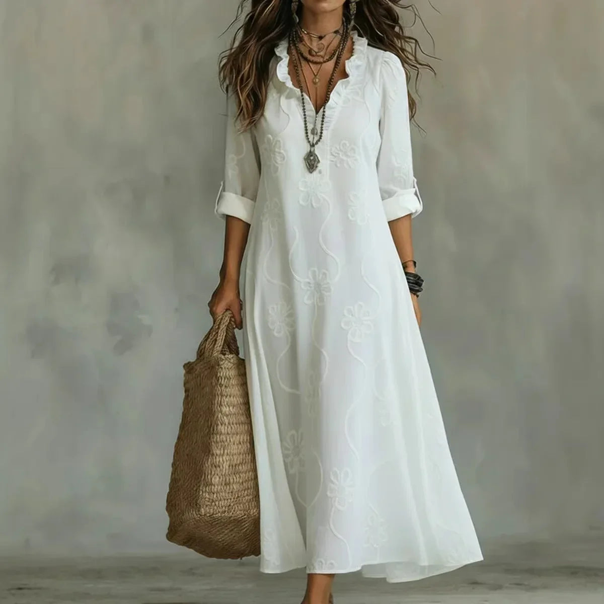 Women's floral maxi dress with V-neckline and three-quarter sleeves